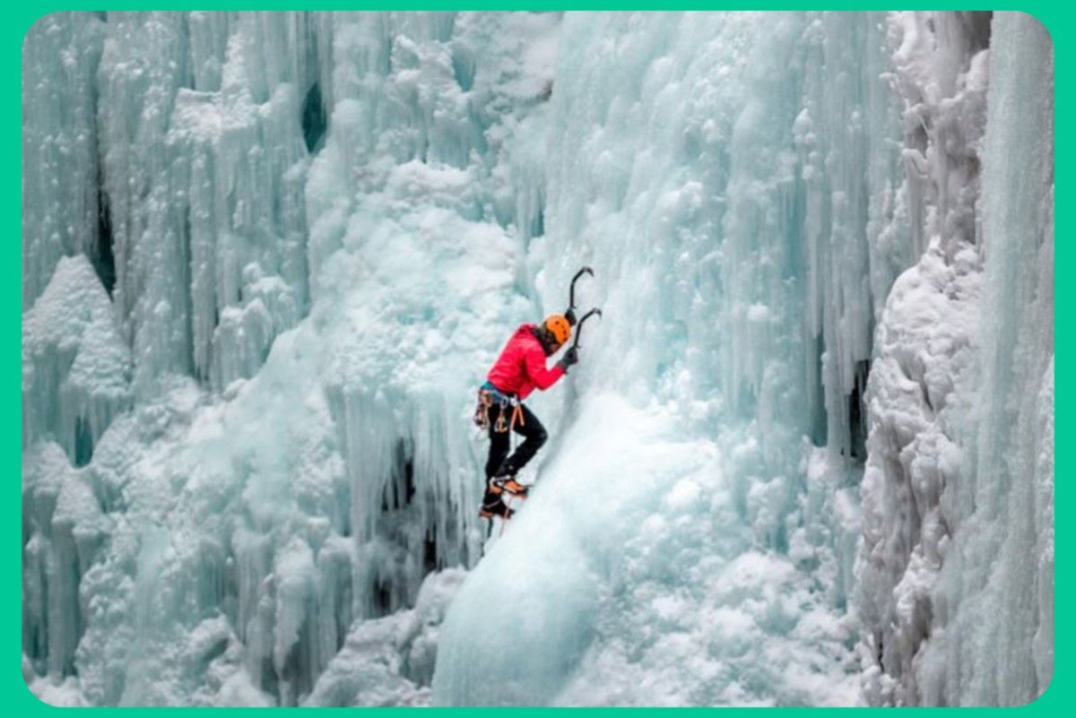 Ice climbing adventure during winter Kashmir tour packages in snow-covered mountains