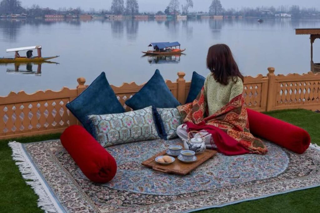 Luxury houseboat stay With Our Kashmir tour Packages on Nigeen Lake Kashmir with traditional tea
