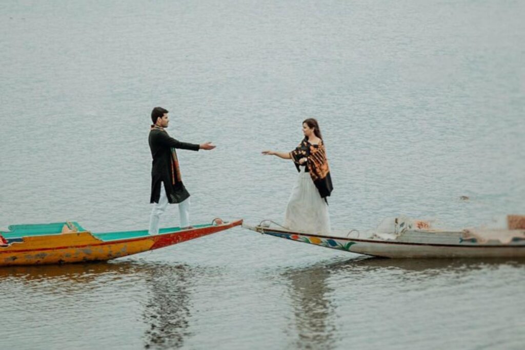 Romantic pre wedding photoshoot in Kashmir on Dal Lake with a couple on shikaras