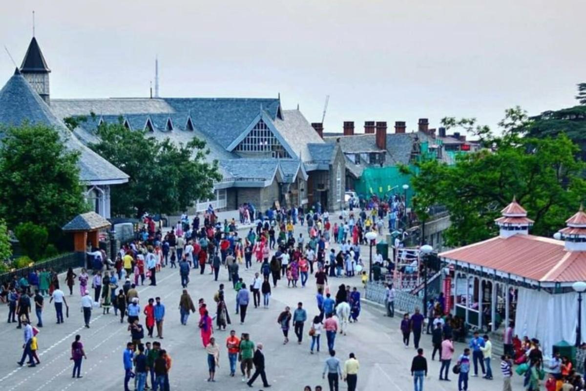 Crowded Mall Road in Shimla with tourists shopping and walking